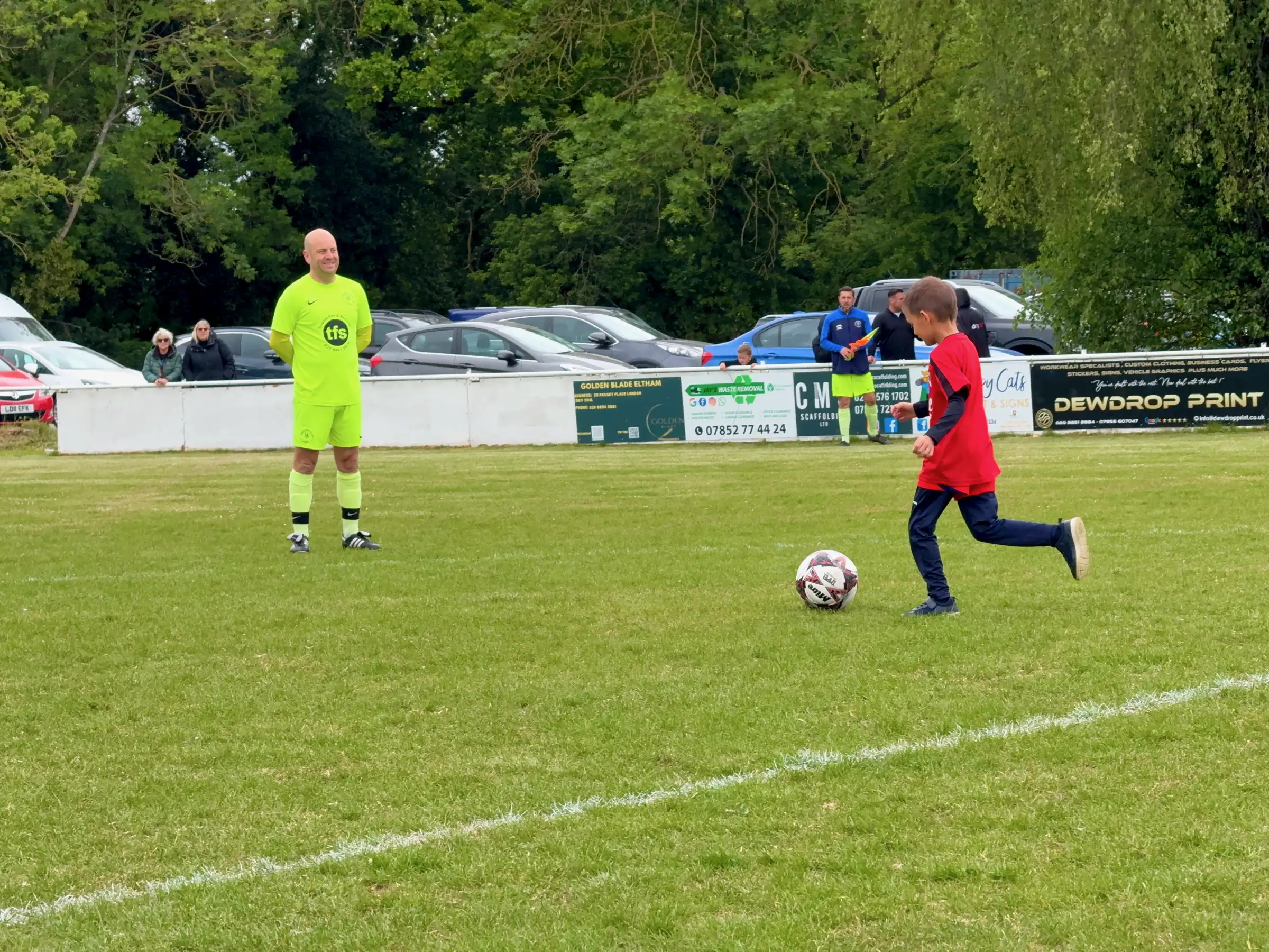 Aleks lining up a strike against a grown-up goalkeeper - the warm-up he insisted on doing himself