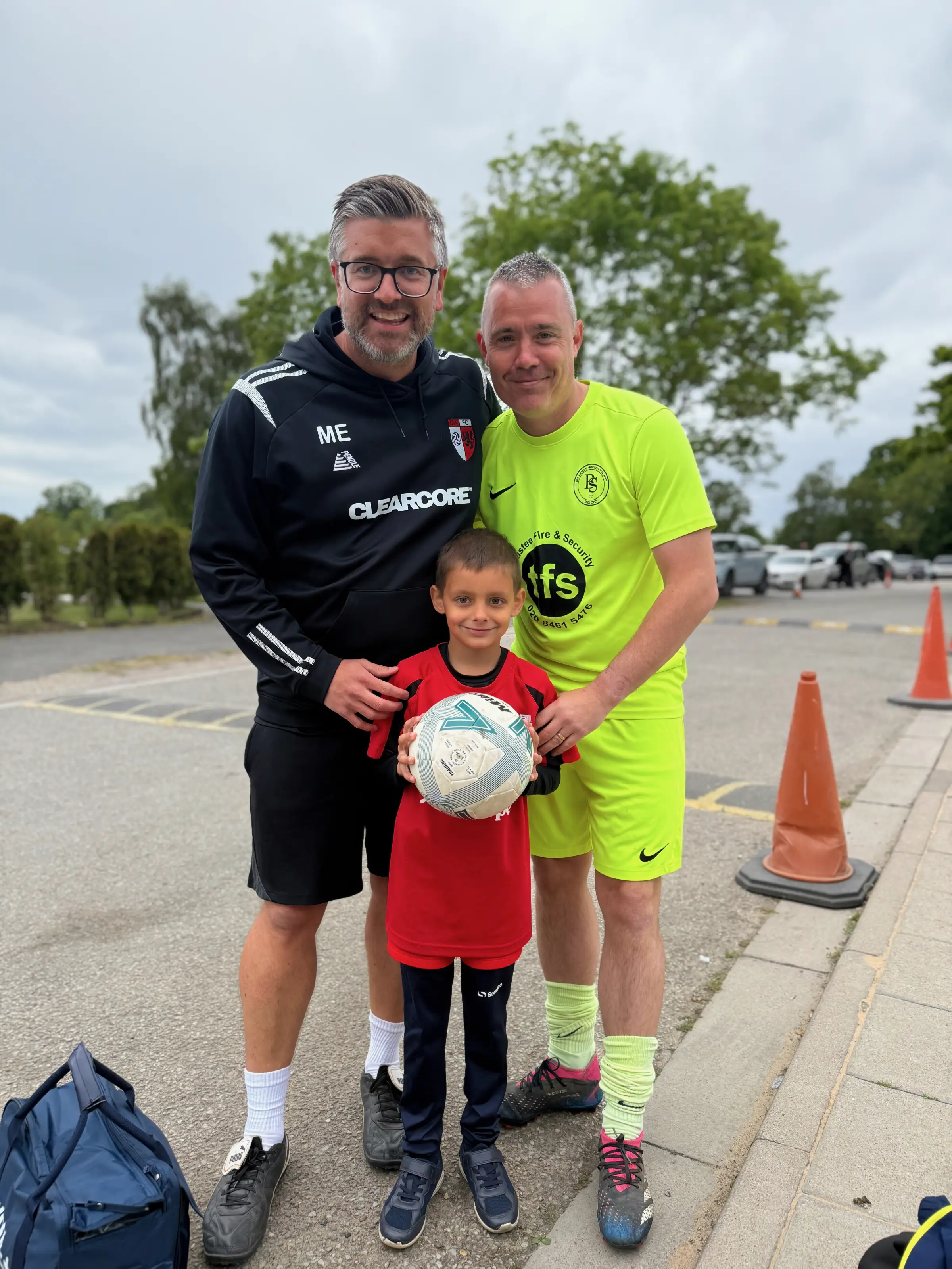 Aleks before kick-off with Mark Ede (Chislehurst Wanderers manager and Aleks's coach at soccer school) and Marc Dolby (Baldon Sports coach and player for the day) - match ball at the ready