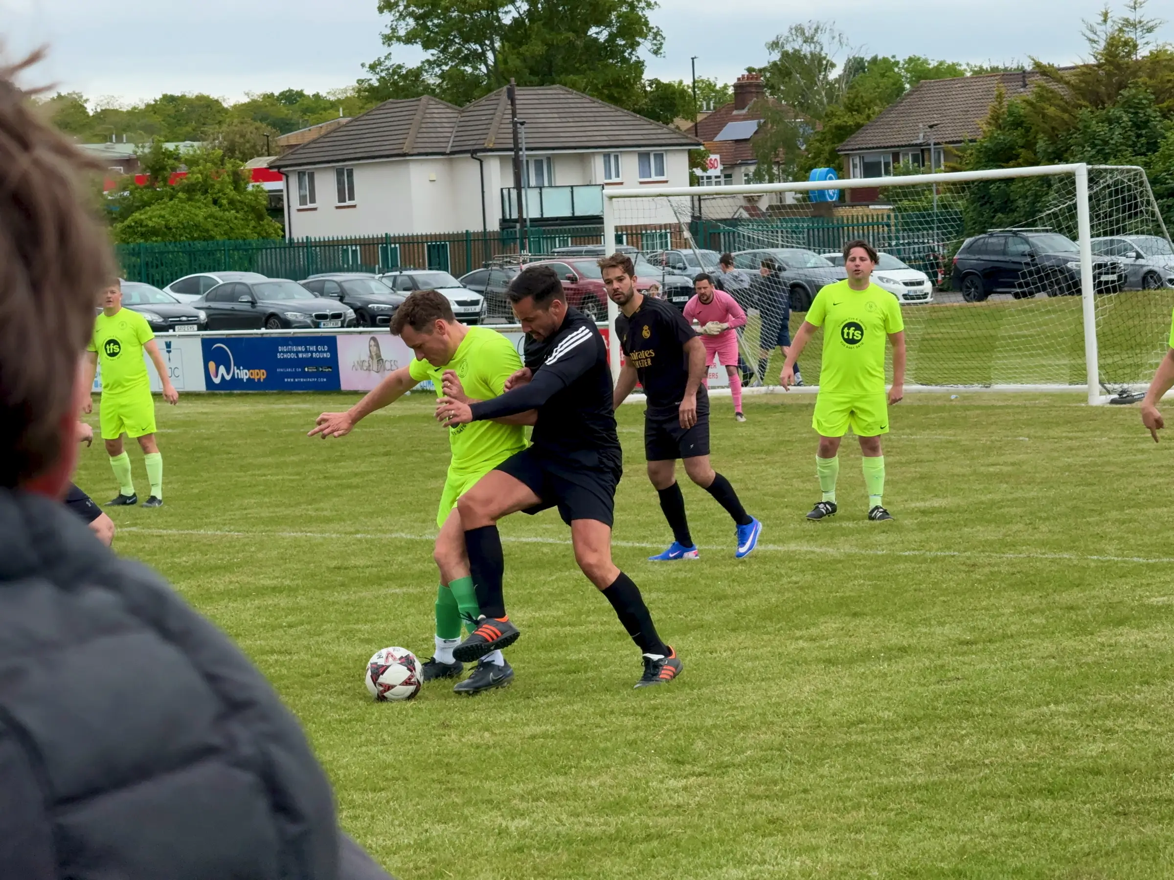 Midfield battle - tackles flying in, both sides giving everything for the cause
