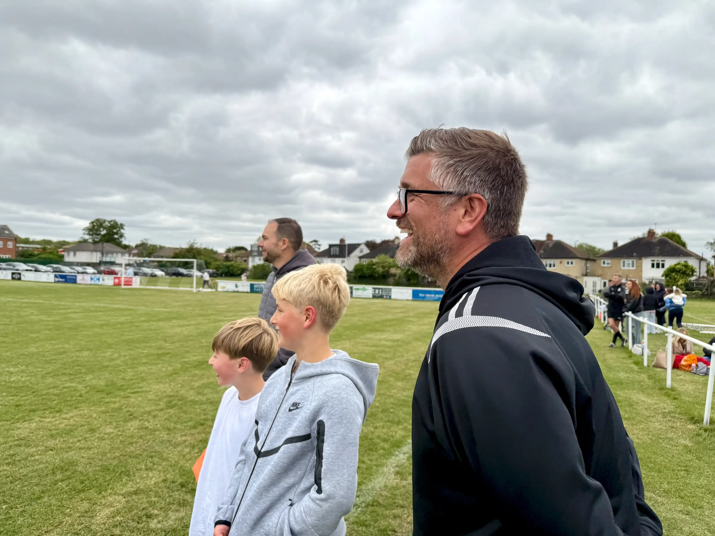 Mark Ede on the touchline with young supporters - a quiet moment between managerial duties at The Oaks