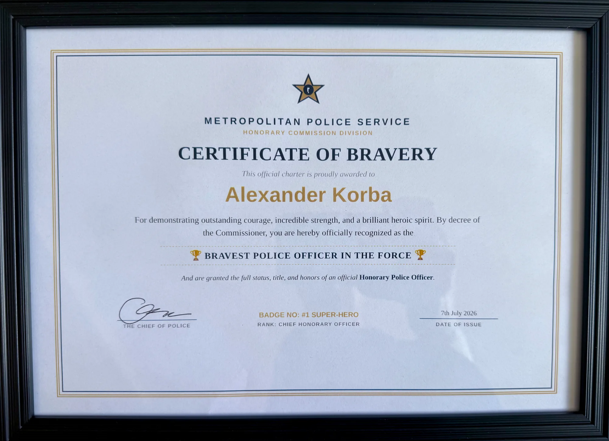 And from the Chief himself - the Certificate of Bravery, naming Aleks the bravest police officer in the force. Badge No: #1 Super-Hero. 🦸