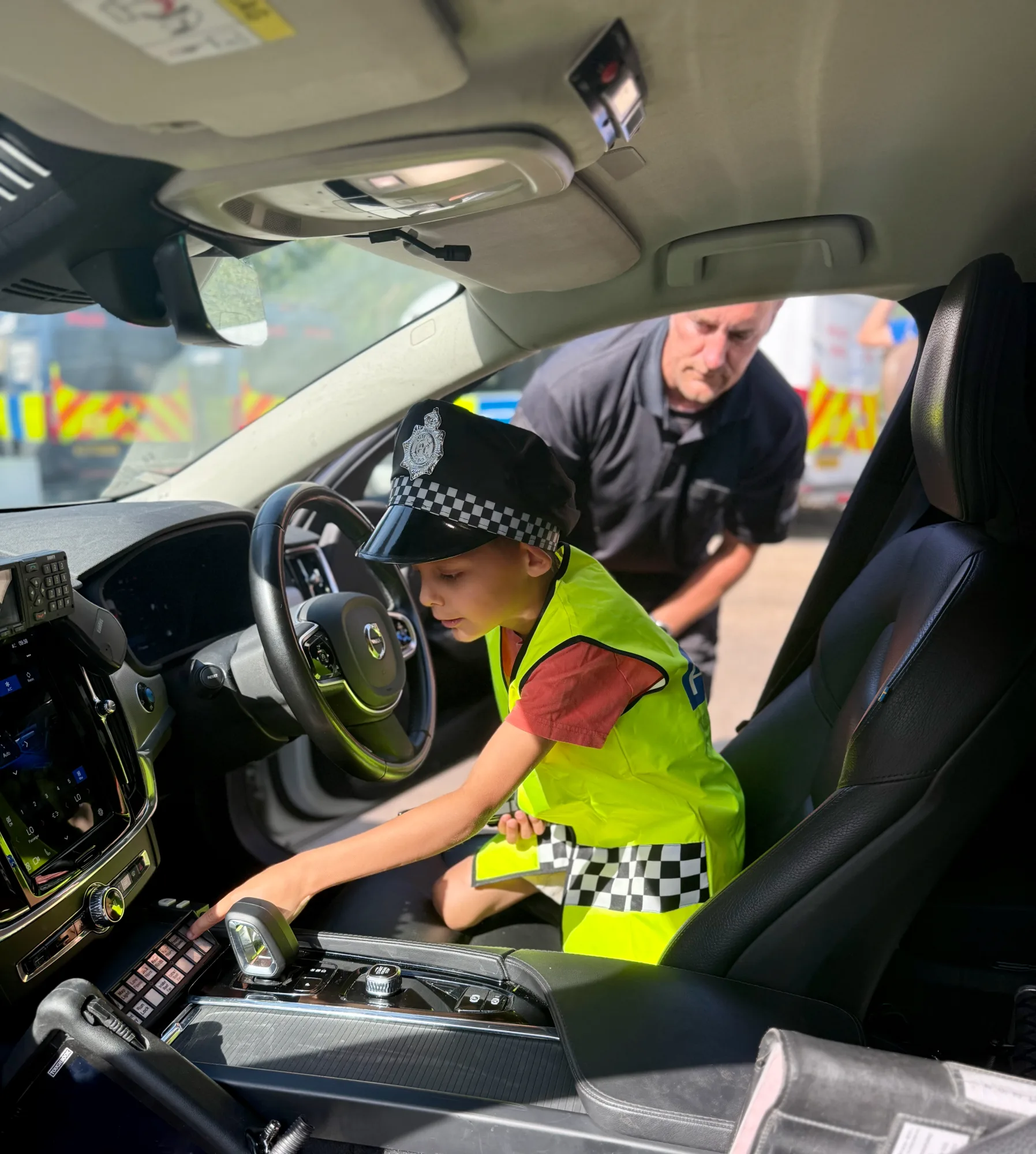 Behind the wheel of a patrol car, learning the controls one by one until he could name them all back.