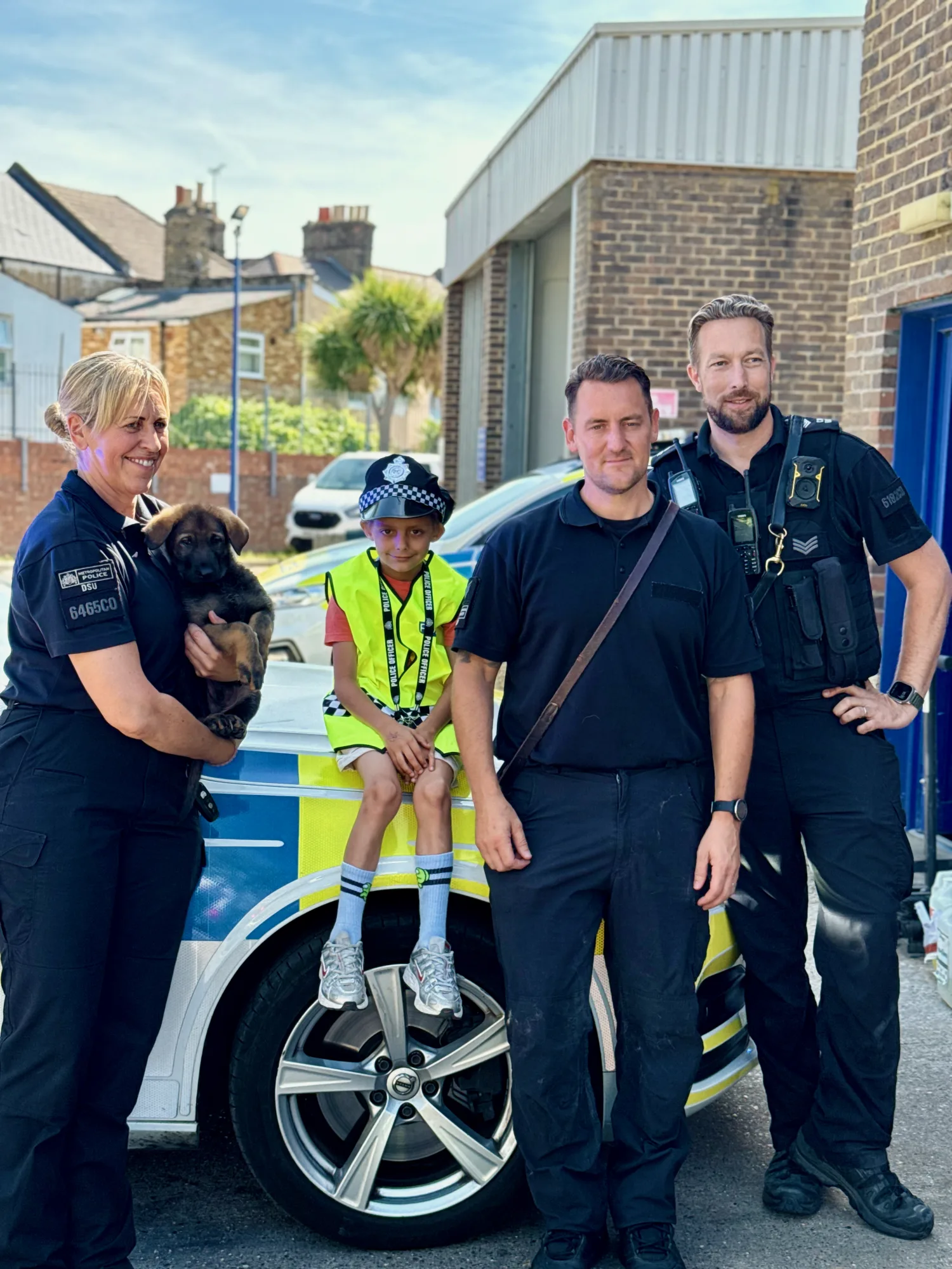 The Dog Section team who made shift one unforgettable - puppy included. 🐶
