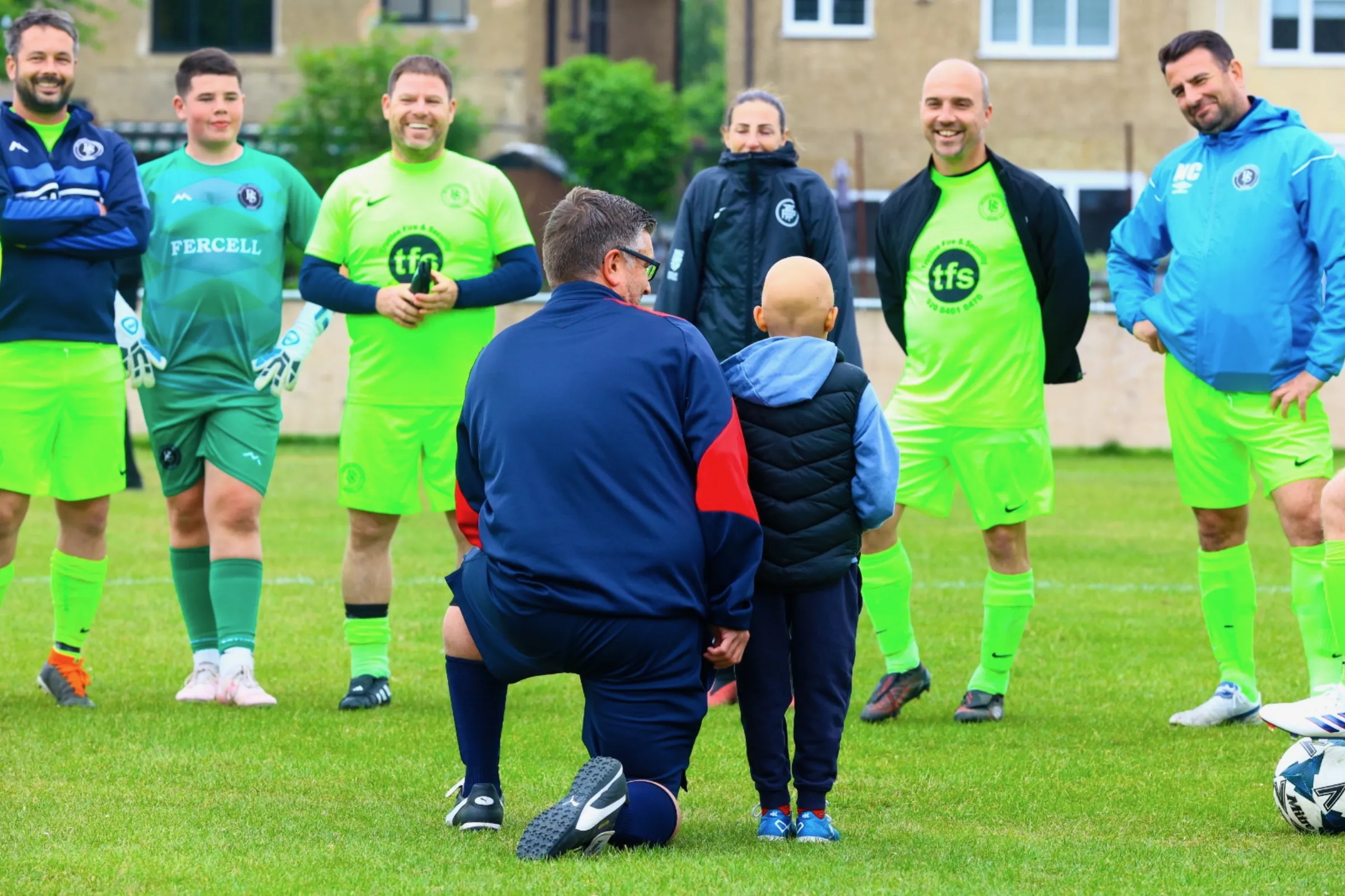 Aleks meets the Baldon Sports coaches before kick-off at the charity match