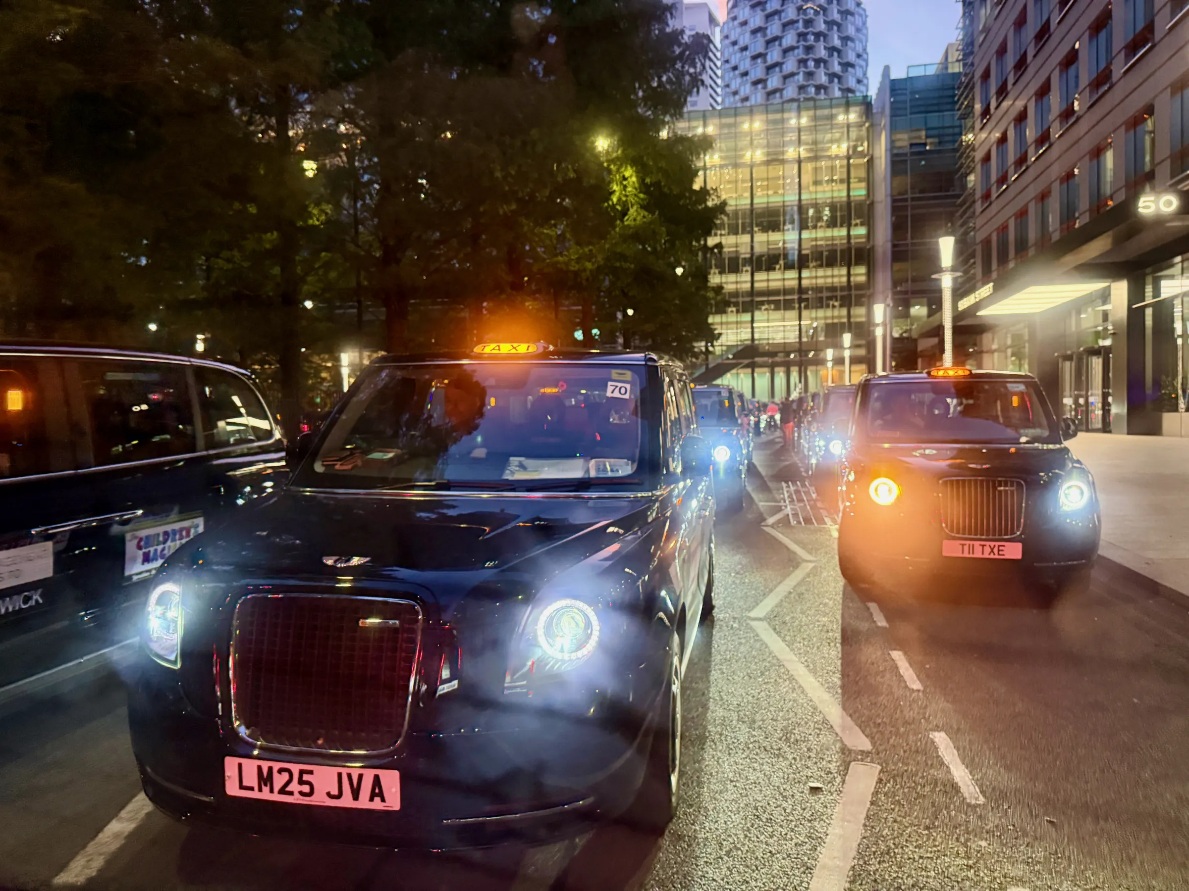 Dawn at Canary Wharf, and we're off: cab horns blaring, police lights flashing, sirens wailing and people lining the streets to cheer us on our way. 🚕
