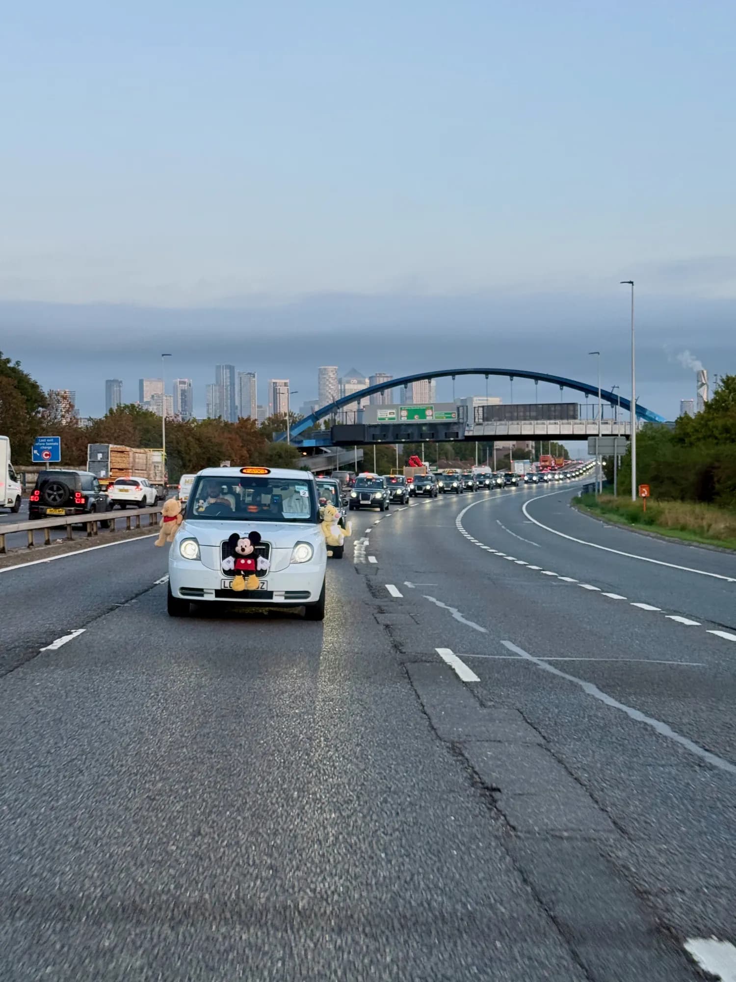 The convoy heads out of London, with the road ahead already cleared for us.