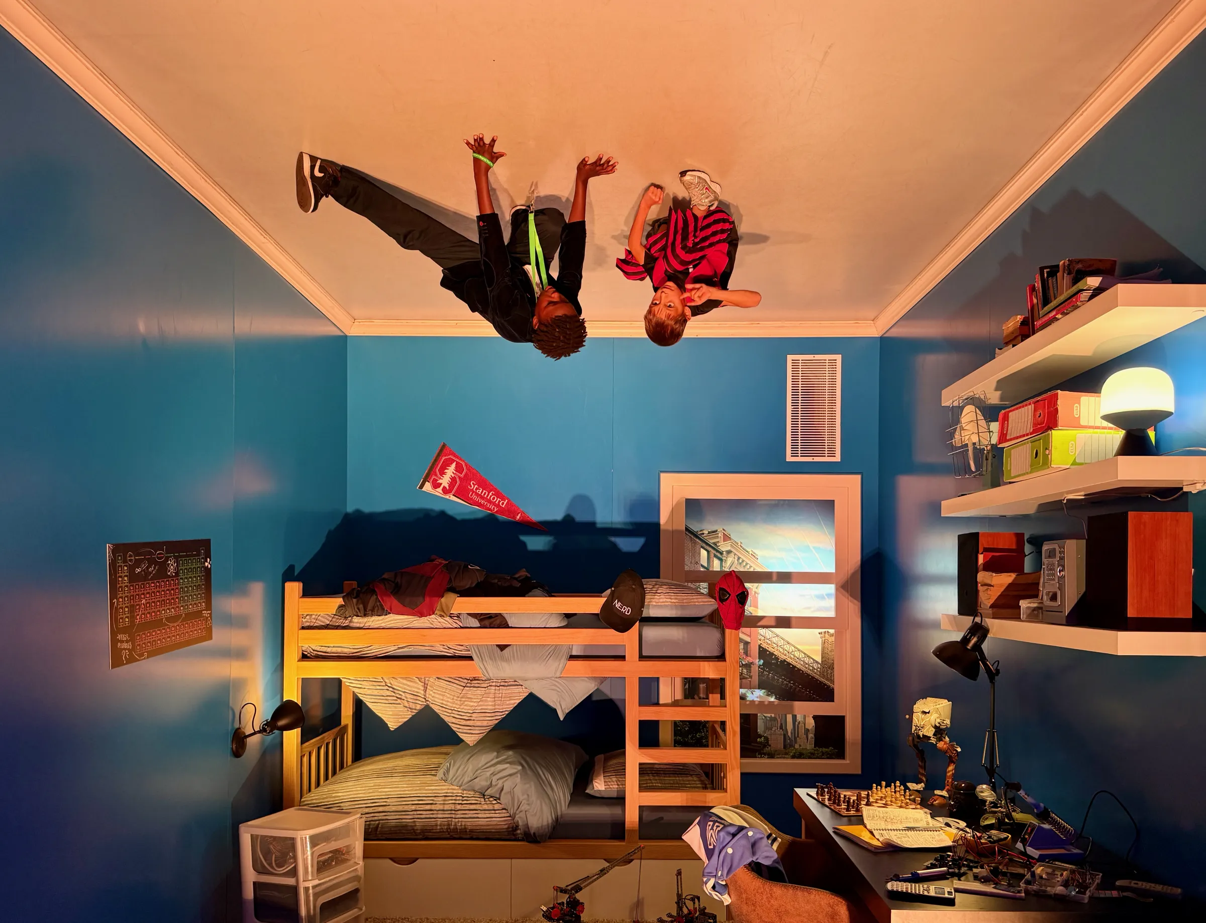 Aleks and his new friend defy gravity in the upside-down room at the ball.